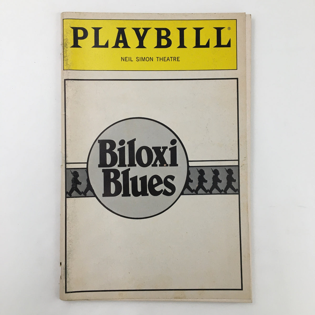 1985 Playbill for Biloxi Blues at Neil Simon Theatre, featuring classic design with title prominently displayed.