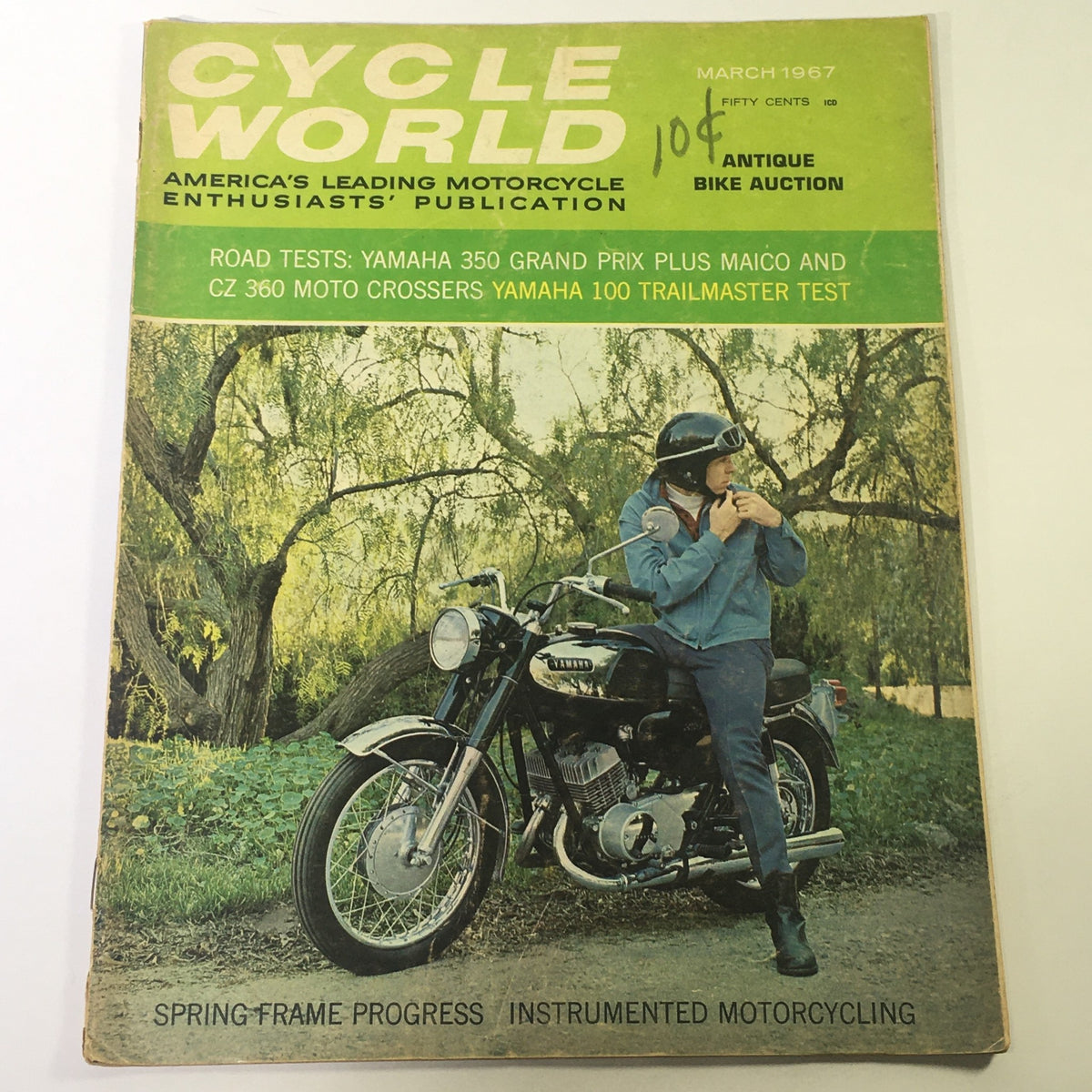 Cover of Cycle World Magazine, March 1967 featuring Yamaha 350 Grand Prix and CZ 360 Moto Cross, showcasing a motorcyclist in vintage attire beside a motorcycle.
