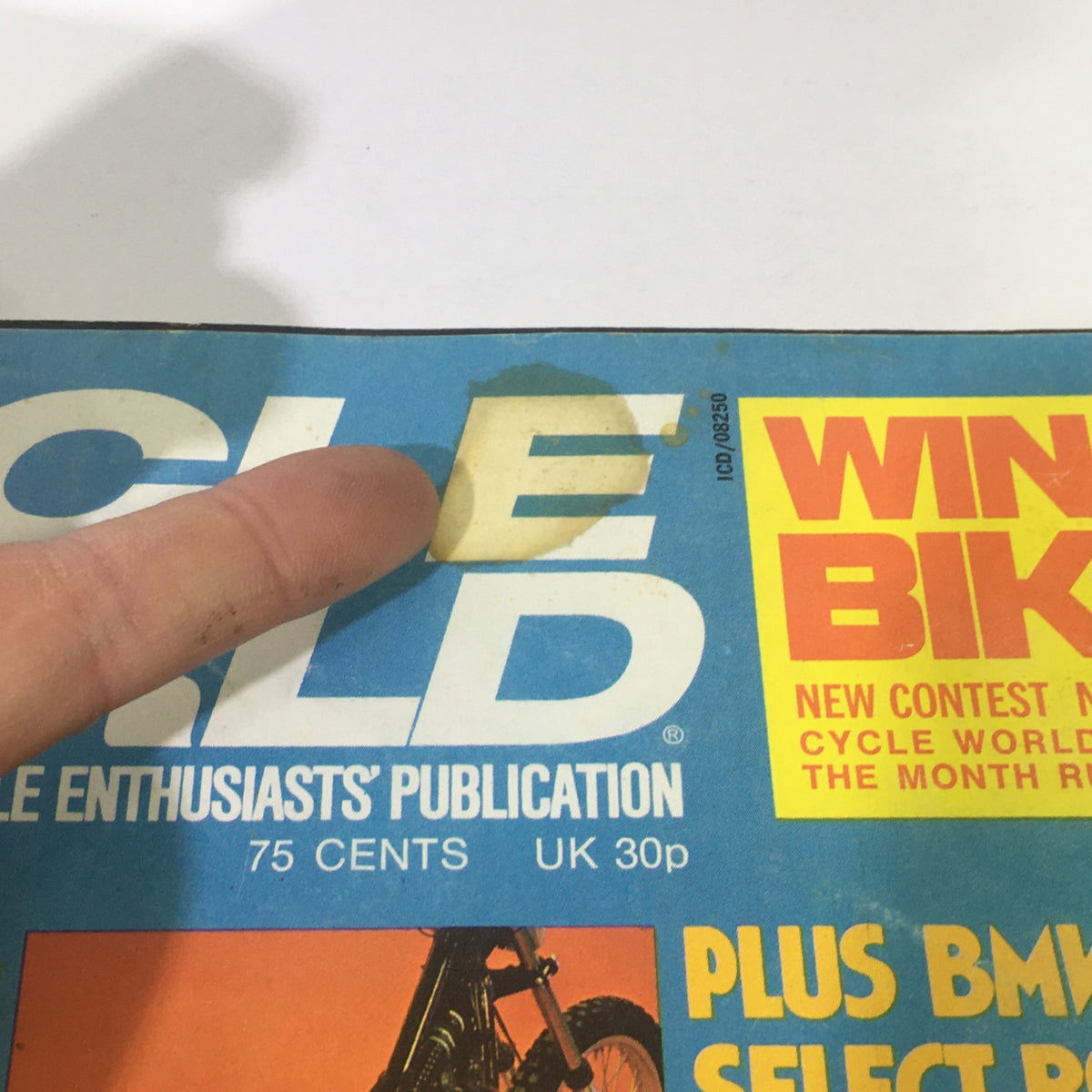 Close-up view of the VTG Motor Cycle World Magazine September 1974 with emphasis on the 'Cycle World' publication logo and its contest details.