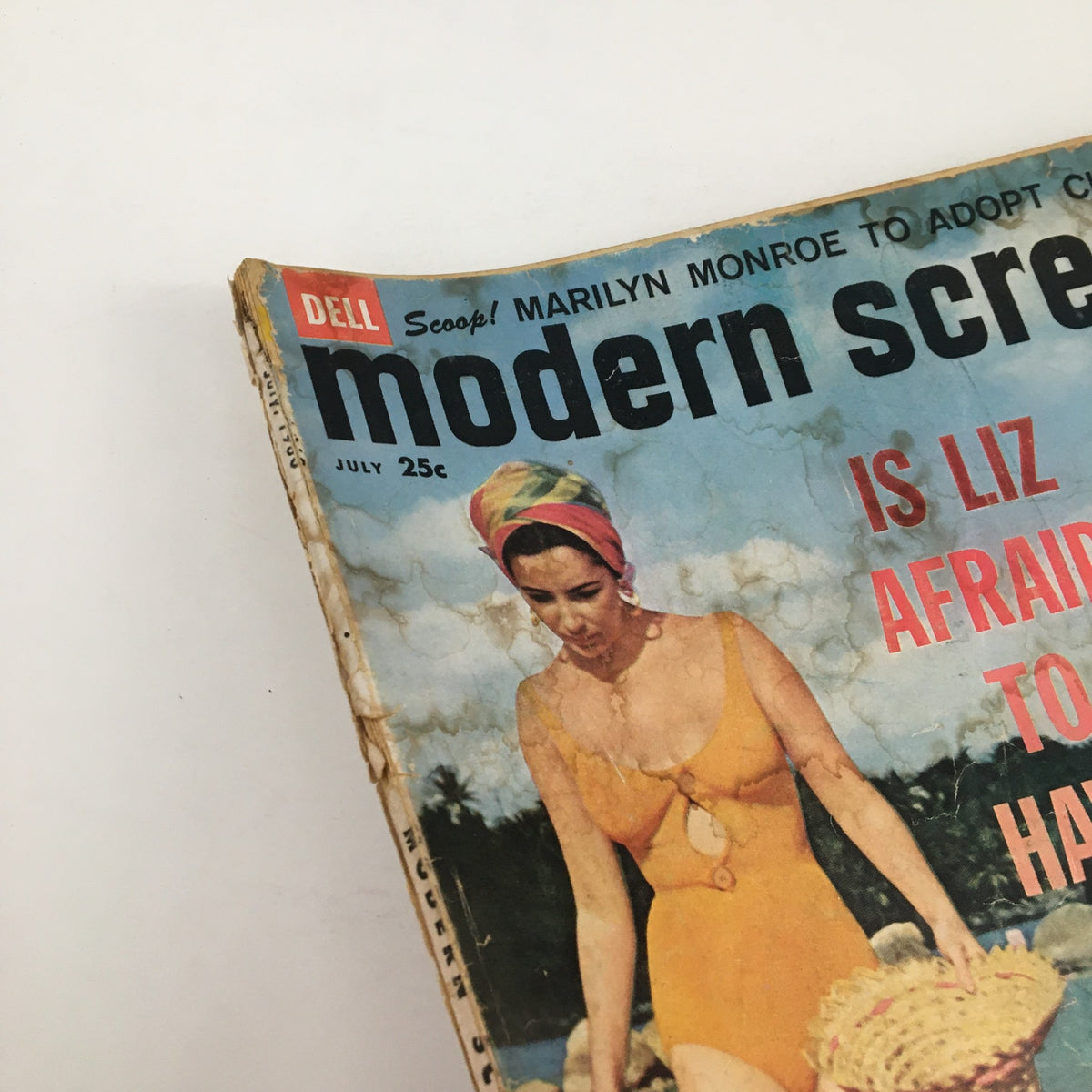 Top view of the Modern Screen Magazine July 1960 showing Elizabeth Taylor in a swimsuit and the magazine's vintage design.