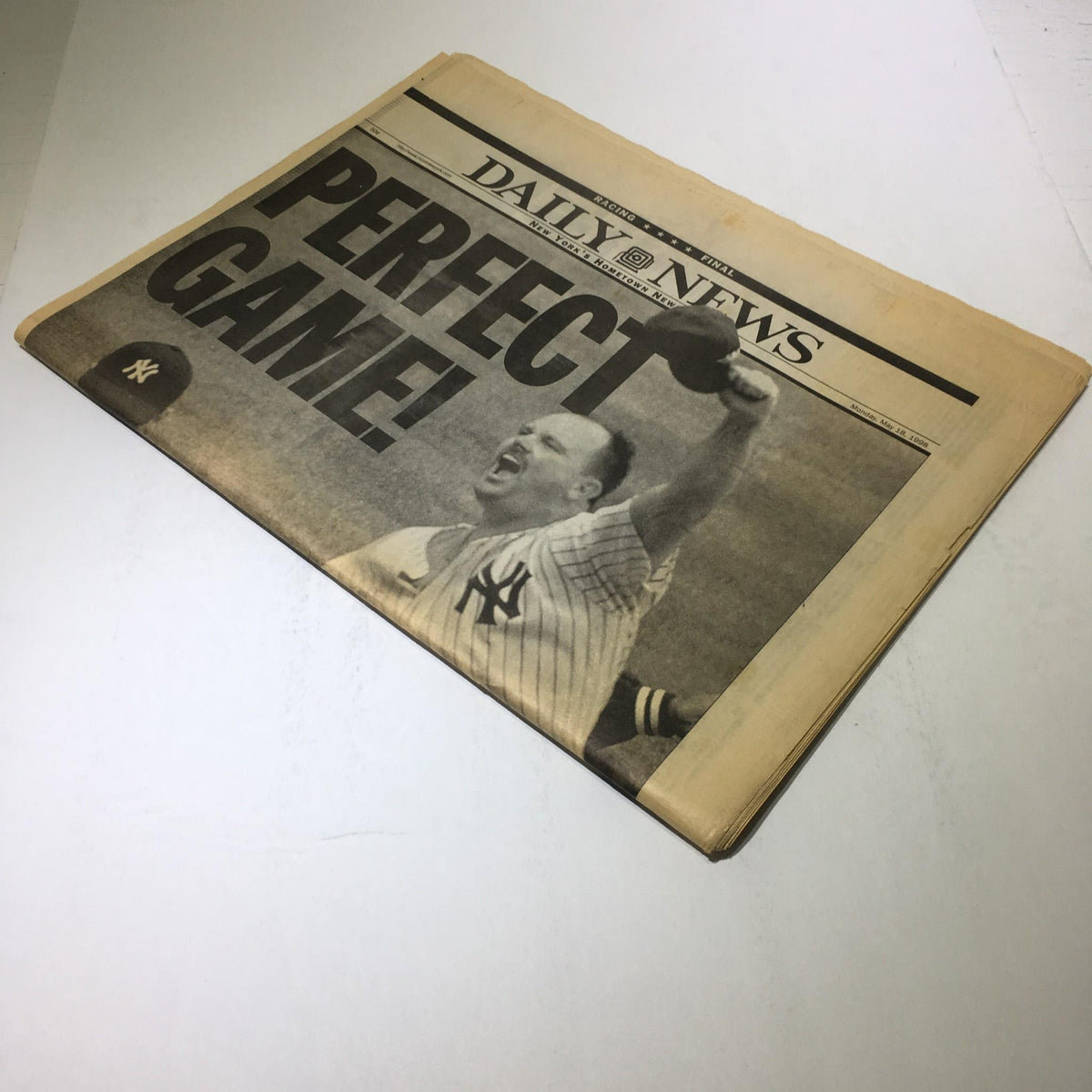 Image of the NY Daily News from May 18, 1998, prominently displaying the title 'Perfect Game!' celebrating Yankees pitcher David Wells' historic achievement.