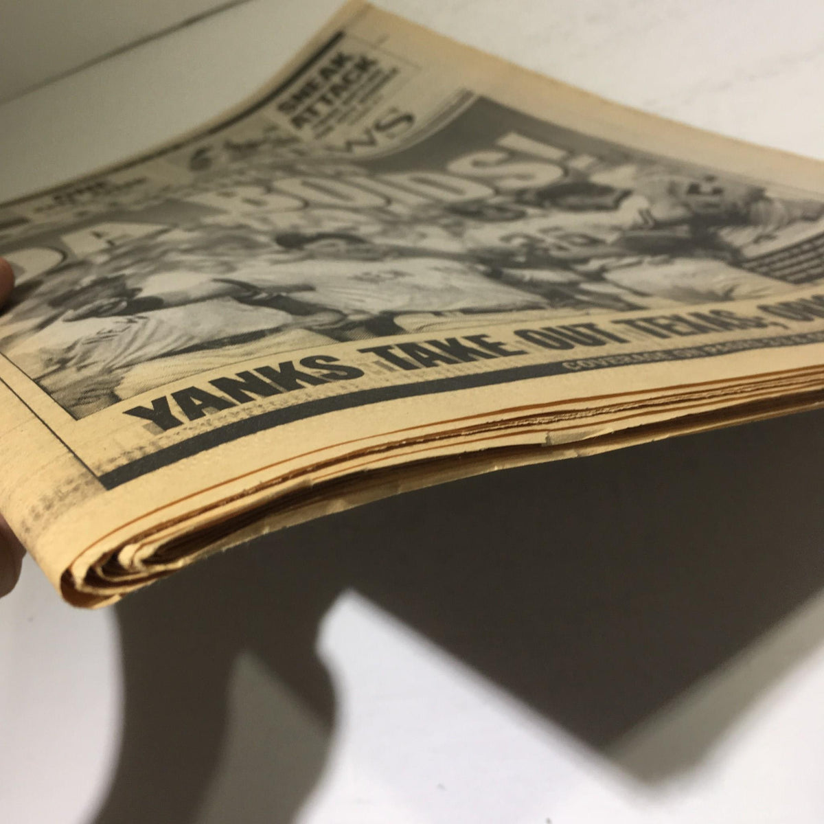 Side view of the NY Daily News vintage magazine from October 6, 1996, showing the fold and edge of the pages, featuring the headline 'Bring On Da Boids! Yanks Take Out Texas; Orioles Next'.