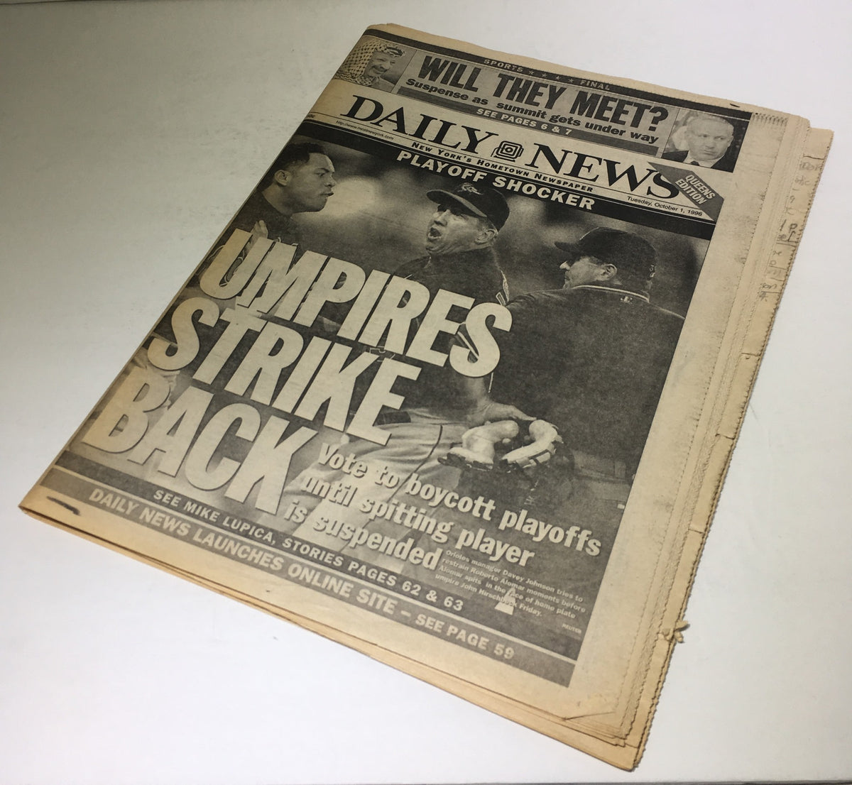New York Daily News cover from October 1, 1996, titled 'UMPIRES STRIKE BACK', discussing the umpire's decision to boycott the playoffs and addressing the suspension of a player.