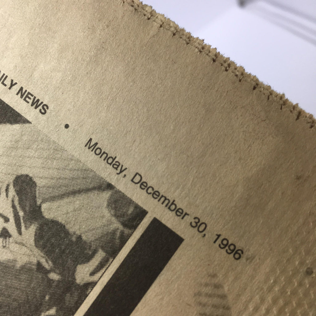 Close-up of the NY Daily News date section, highlighting 'Monday, December 30, 1996', from the issue featuring 'Kings Of The Hill', offering a glimpse into nostalgic sports history.