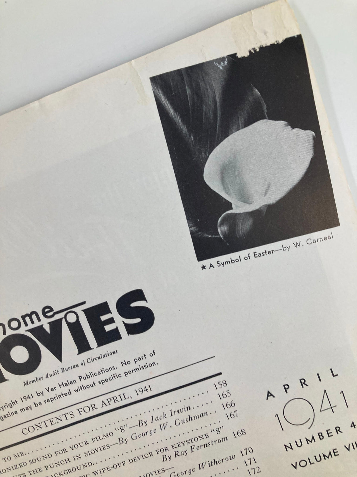 Close-up of a page from VTG Home Movies Magazine April 1941, highlighting an artistic photo titled 'A Symbol of Easter' by W. Carneal.