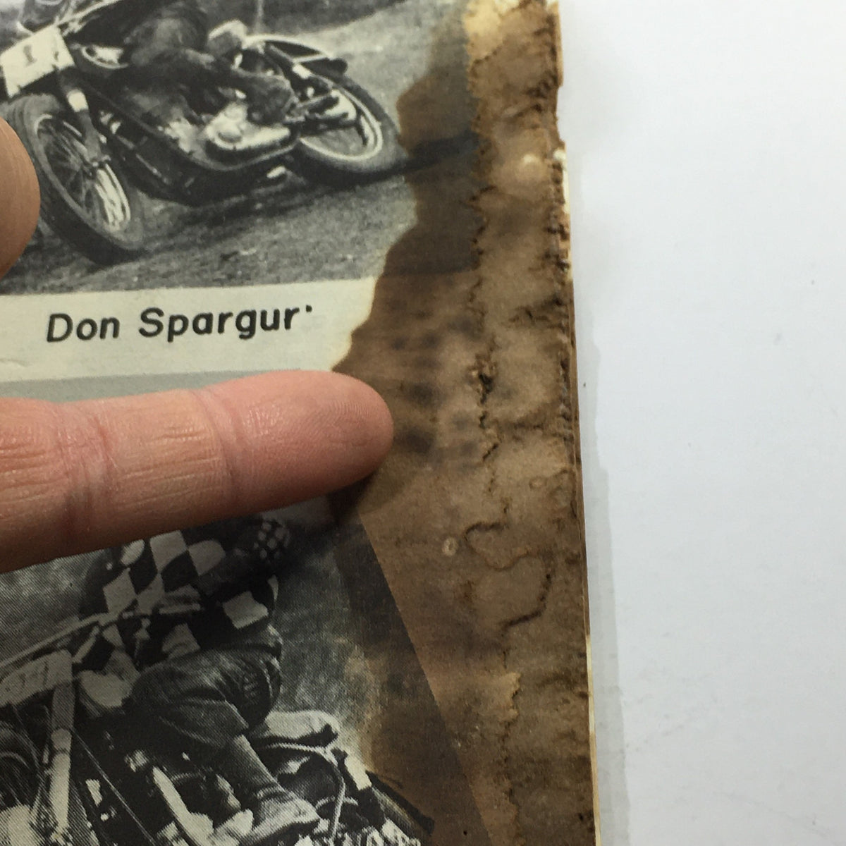 Close-up of VTG Cycle Sport Magazine September 1961 featuring Don Spargur's name alongside an image of him racing, highlighting key cyclists of the era.