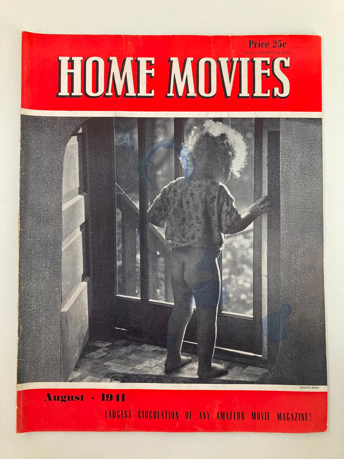 VTG Home Movies Magazine August 1941 cover featuring a child looking out the window, showcasing vintage design for a wedding movie.
