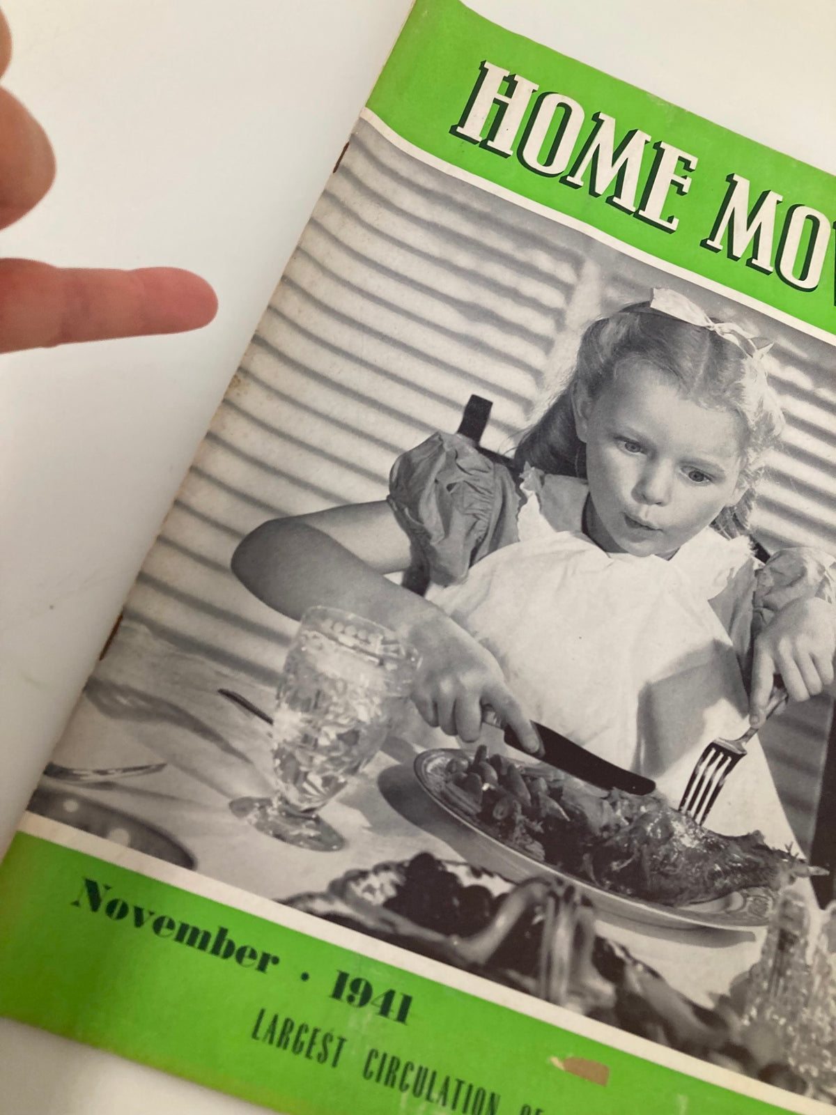 Cover of VTG Home Movies Magazine November 1941 featuring a young girl at a dining table with a plate of food, highlighting the Lloyd Bacon Trophy.