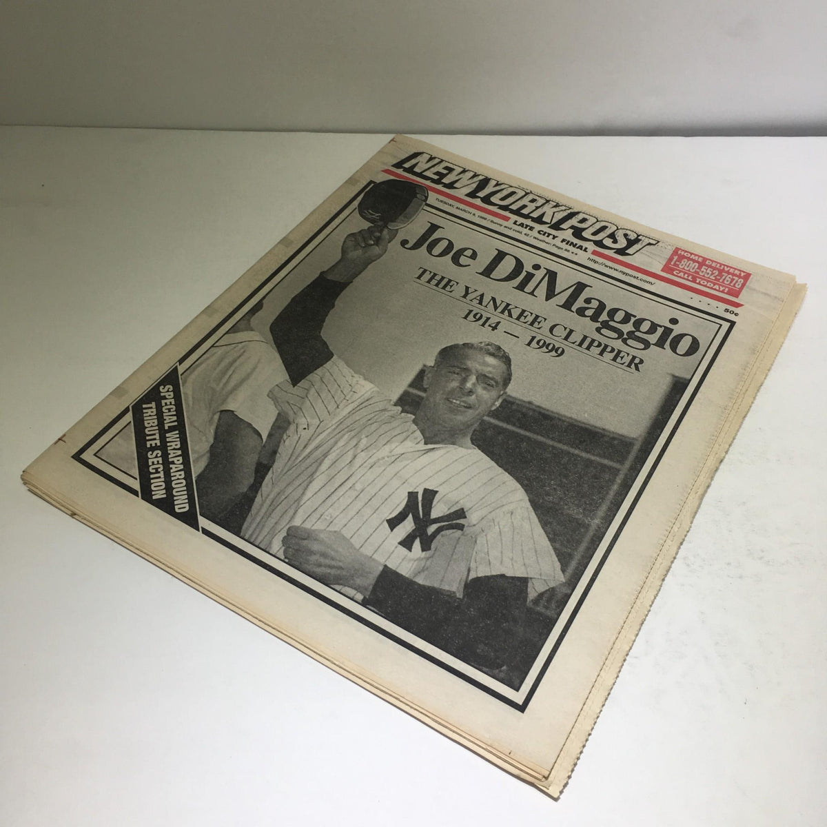 Alternate view of the New York Post cover depicting Joe DiMaggio, titled 'Joe DiMaggio: The Yankee Clipper 1914-1999', displaying him in a Yankees uniform.