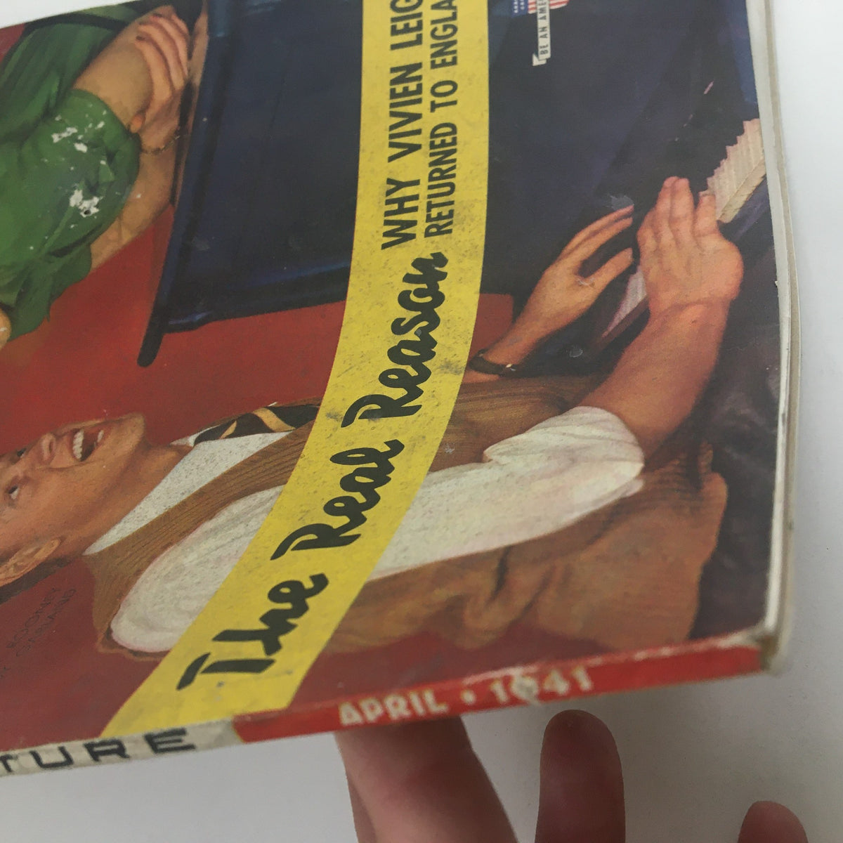 Close-up of the April 1941 Motion Picture Magazine cover featuring an abstracted view of a character's hand on a piano, highlighting vintage aesthetics and captivating graphics.