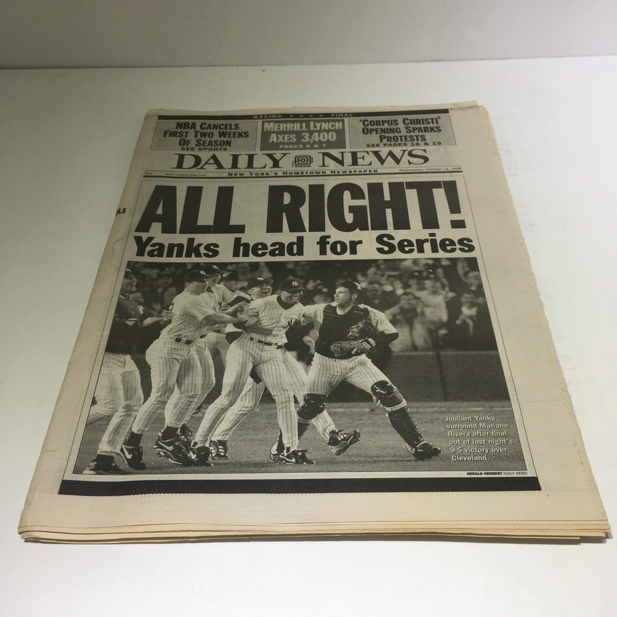 NY Daily News headline on October 14, 1998: 'ALL RIGHT! Yanks head for Series'. The image captures the excitement of New York Yankees players celebrating their victory.