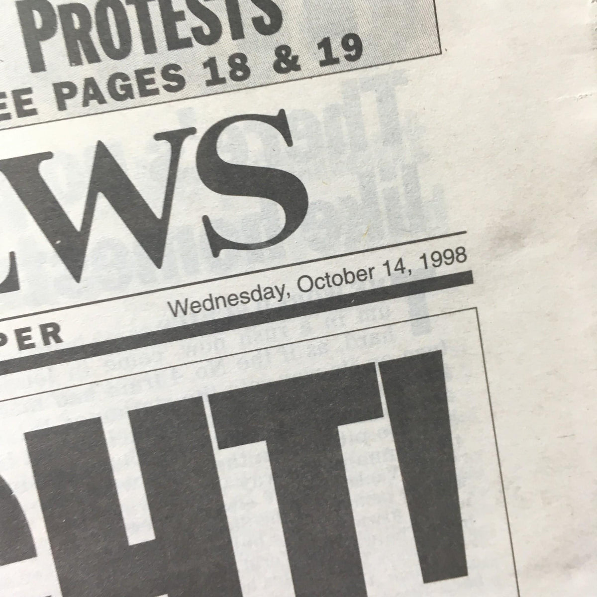 Close-up of the NY Daily News dated October 14, 1998, featuring the headline 'ALL RIGHT!' with the date prominently displayed above.