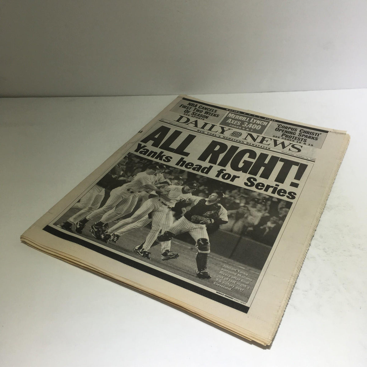Another view of the NY Daily News front page from October 14, 1998, showcasing the headline 'ALL RIGHT! Yanks head for Series' with players celebrating.