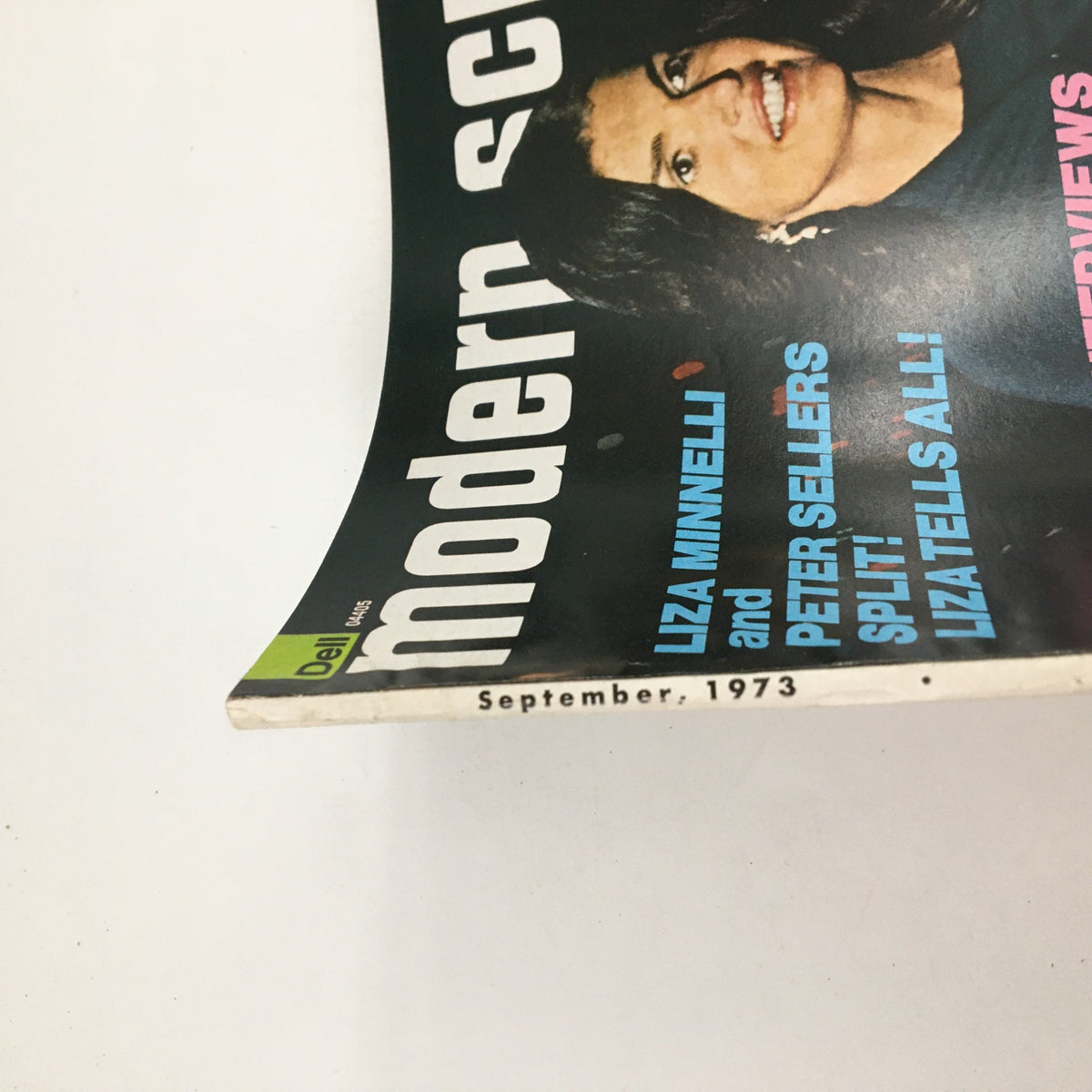 Side view of Modern Screen Magazine September 1973 showcasing the title and month, highlighting Liza Minnelli and Peter Sellers news.