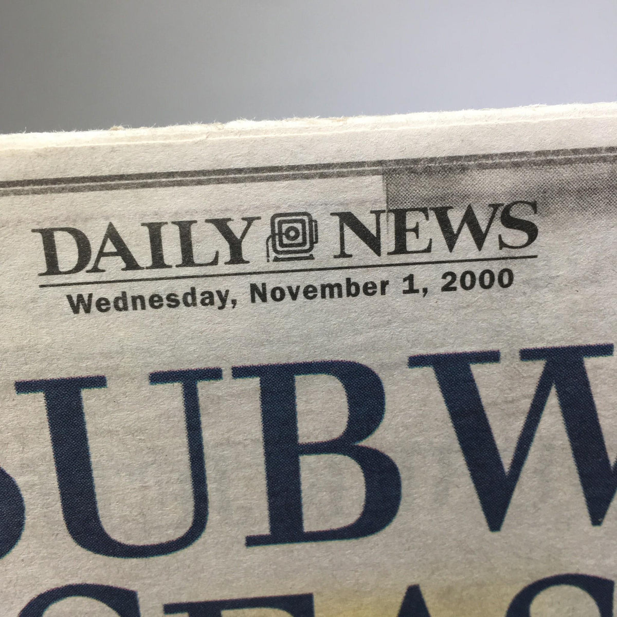 Close-up of the NY Daily News header from November 1, 2000, emphasizing the publication's date and branding related to A Subway Season.