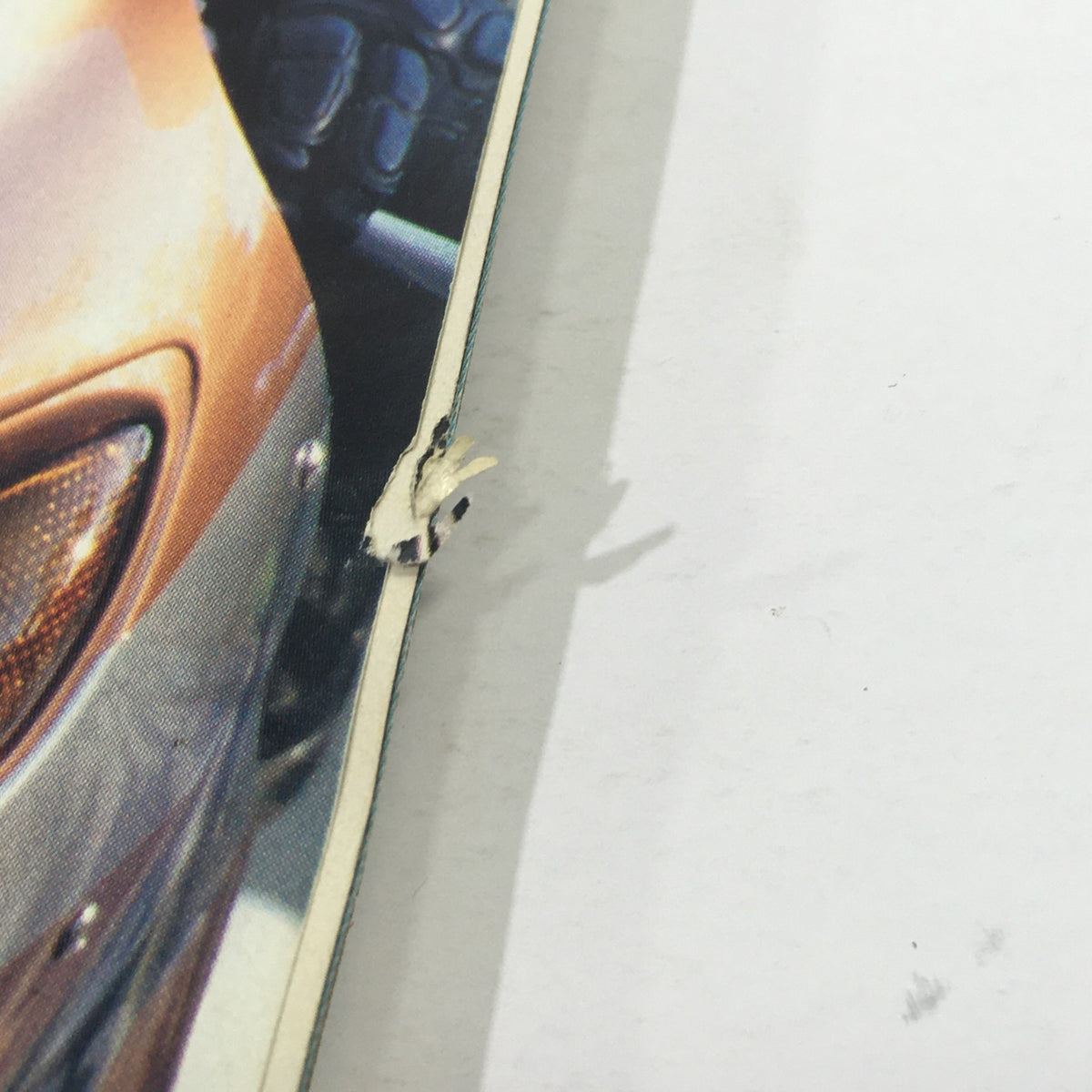 Close-up detail of Cycle World Magazine June 1999 showing minor wear on the edge, part of the collectible magazine featuring Suzuki 1300 Hayabusa and Kawasaki ZX-12 Monster.