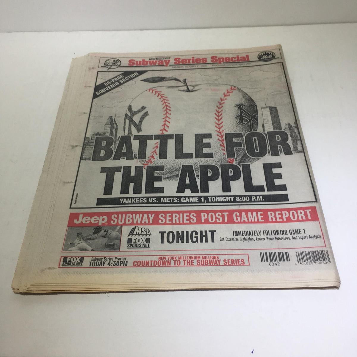 New York Post sports cover titled 'Battle for the Apple' featuring a graphic of baseballs, promoting Yankees vs. Mets game.