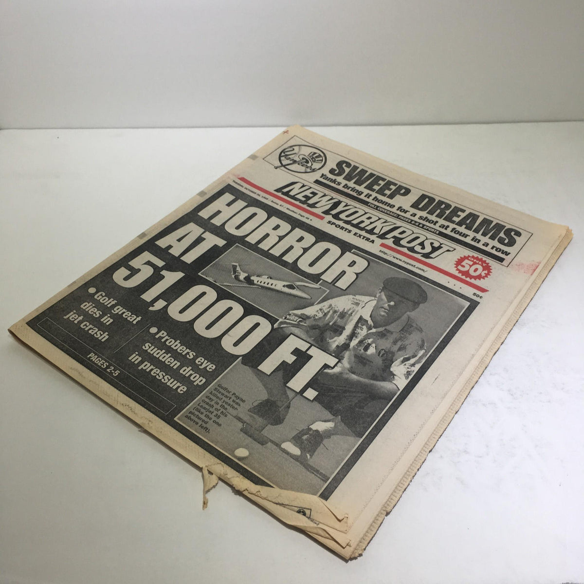 New York Post newspaper from October 26, 1999, featuring the headline 'Horror At 51,000 FT' with an image related to jet crash details, showcasing the iconic design of the front page.