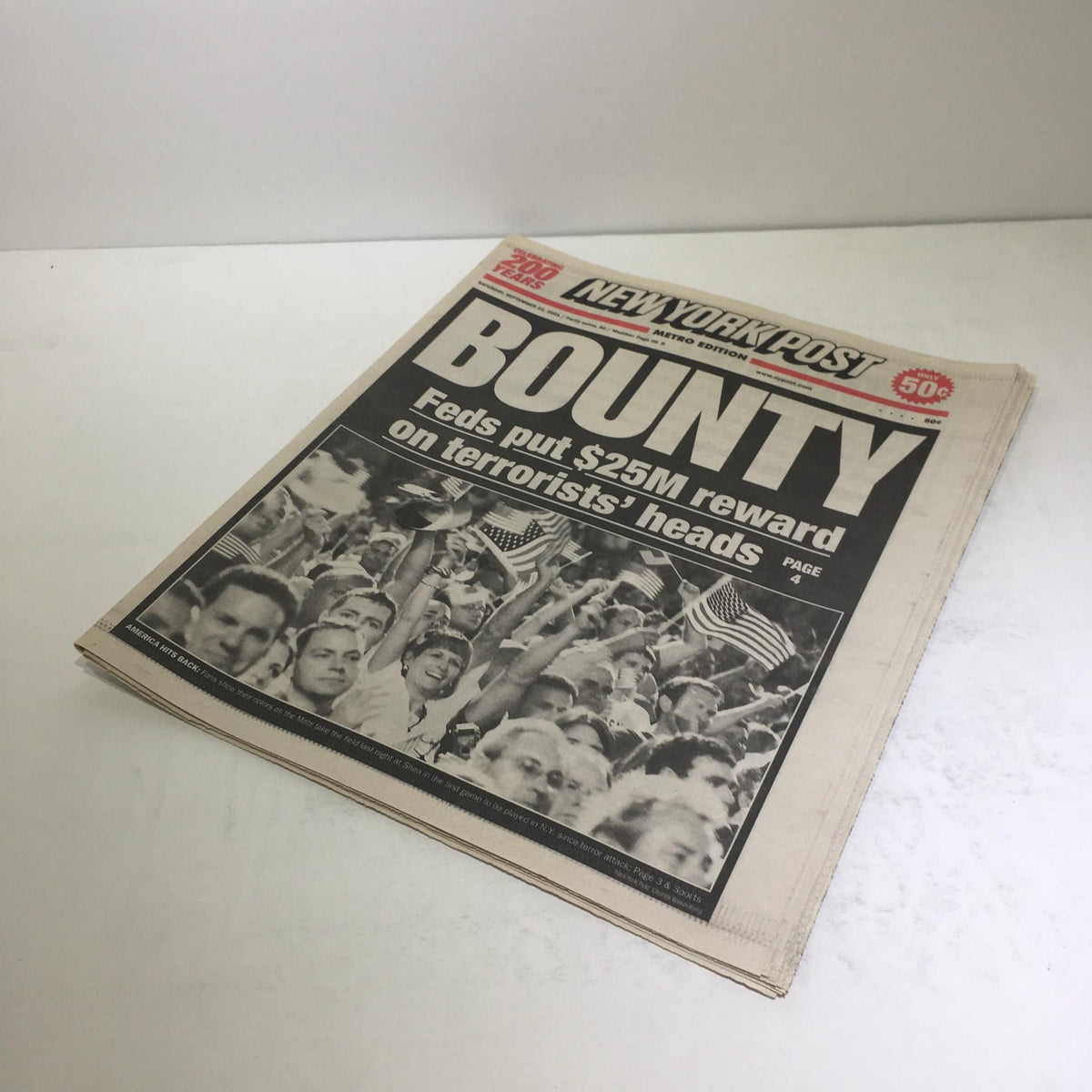 New York Post cover from Sept 22, 2001, titled Bounty, highlighting the $25M reward for terrorists' heads with a crowd photo.
