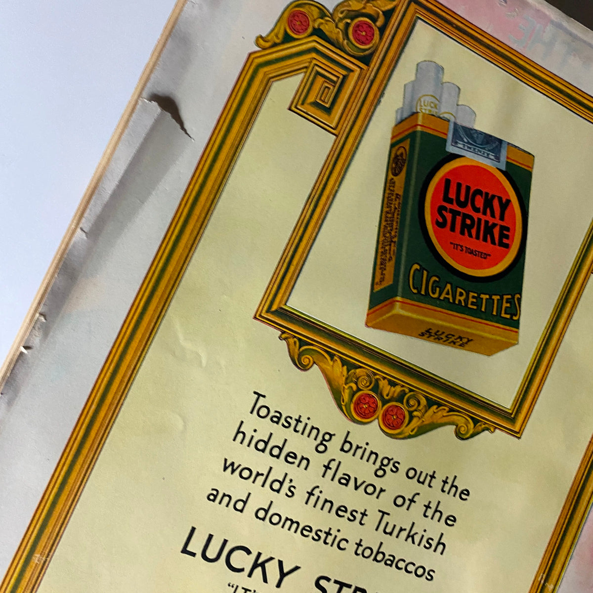 The New Yorker Complete Magazine June 4, 1927, showcasing a detailed view of Lucky Strike cigarette advertisement, emphasizing toasting for flavor enhancement.