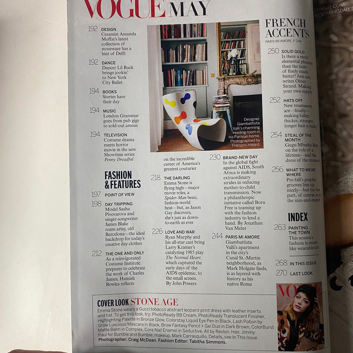 Vogue Magazine May 2014, featuring a glimpse of editorial pages, including fashion and design content.