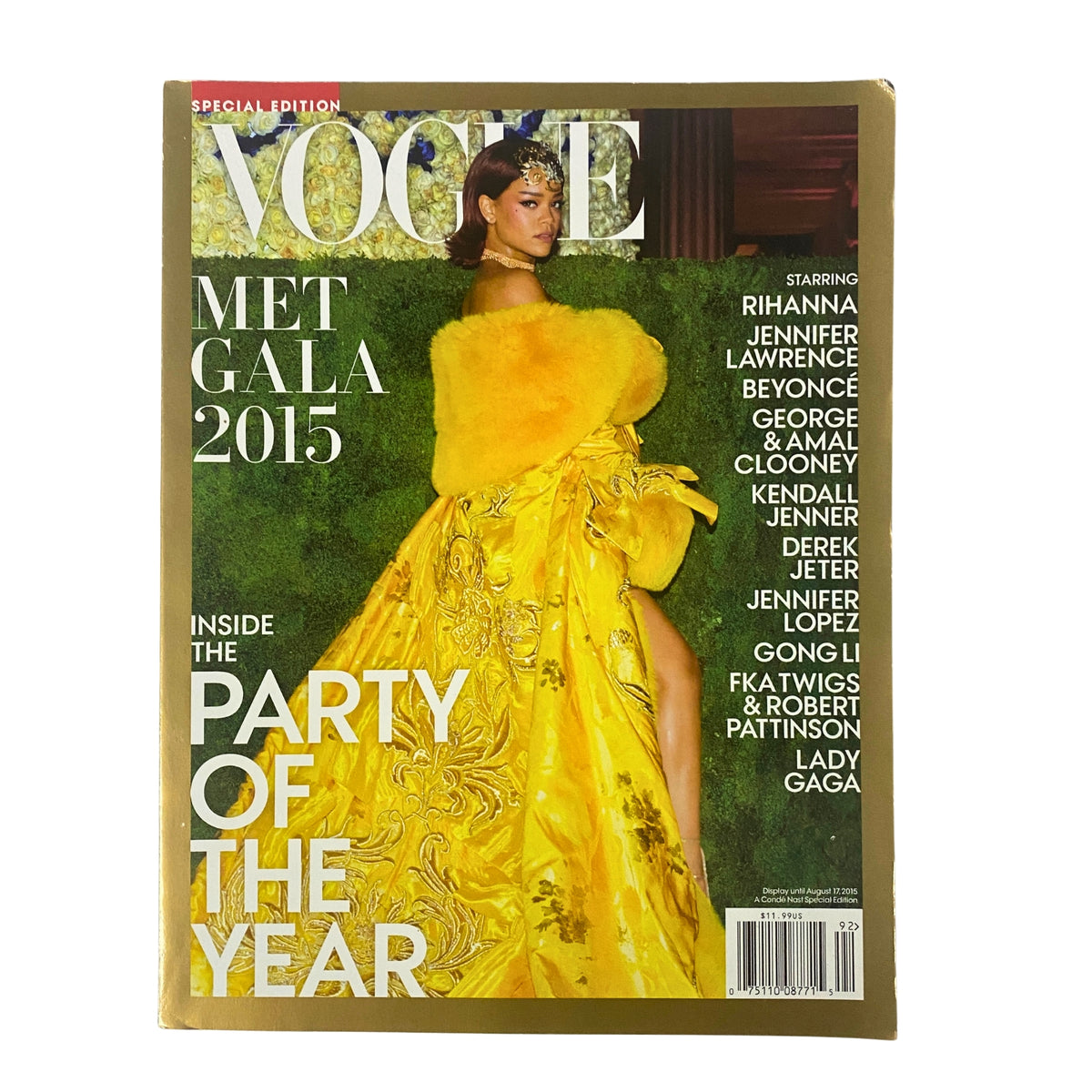 Vogue Magazine 2015 cover featuring Rihanna in a stunning yellow gown for the Met Gala, highlighting the special theme 'China: Through the Looking Glass'.