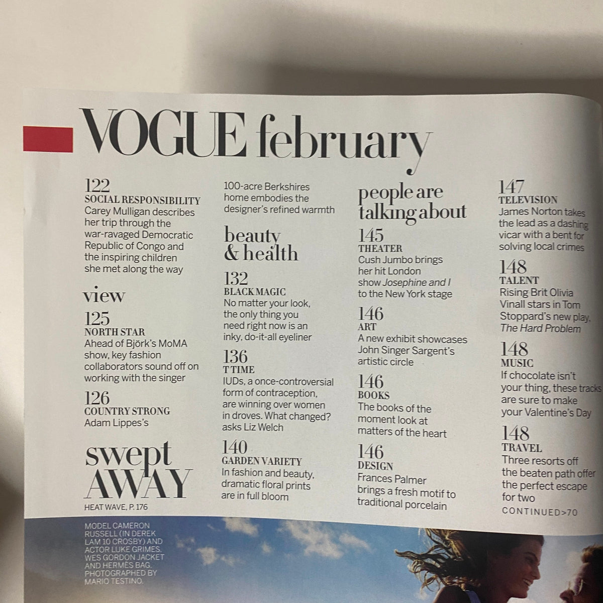 Vogue Magazine February 2015 Dakota Johnson Cover showing contents on page with fashion and wellness highlights, including features on social responsibility and beauty trends.