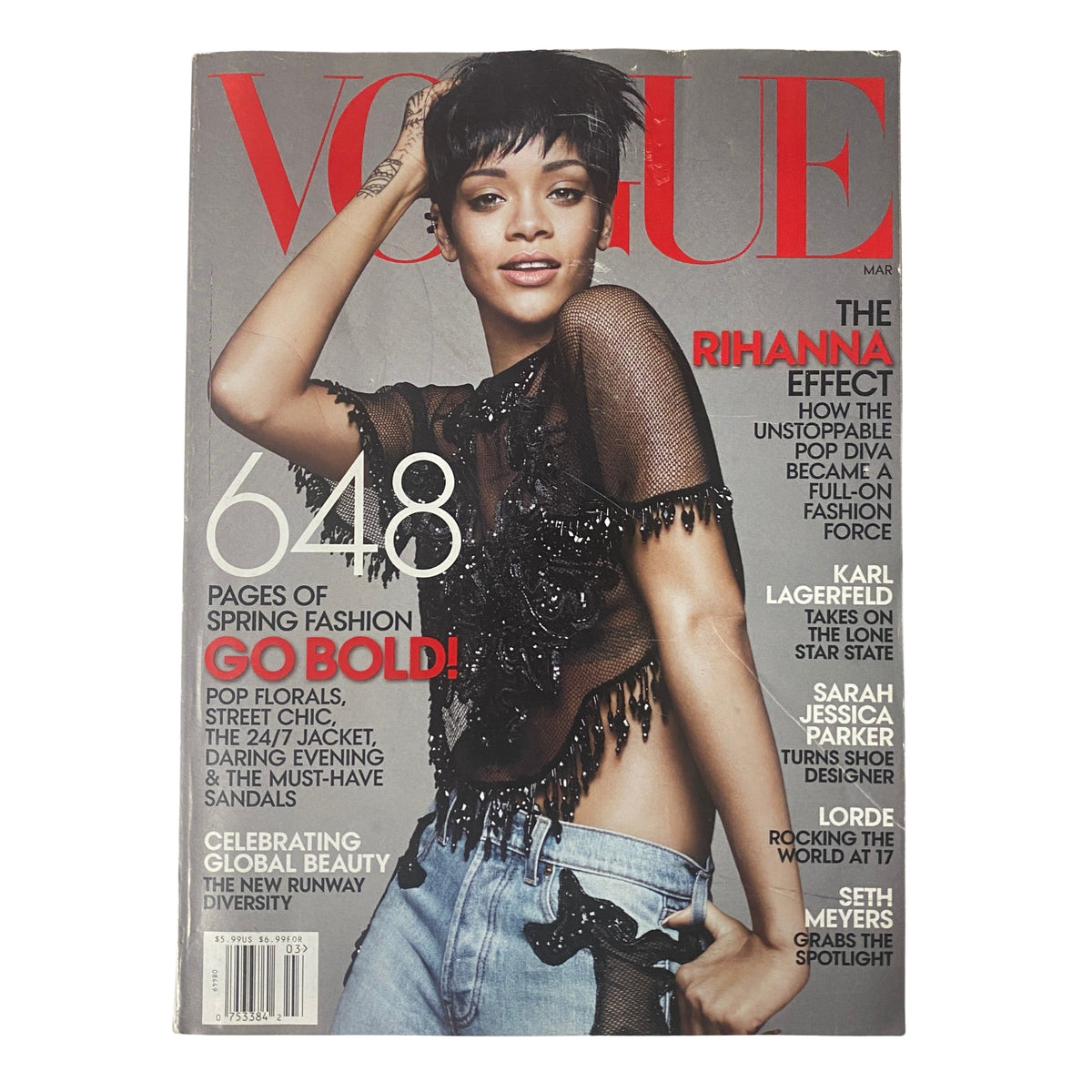 Cover of Vogue Magazine March 2014 featuring Rihanna, showcasing the title 'The Rihanna Effect'. The cover highlights the bold fashion theme with the tagline 'GO BOLD!' and mentions featured articles on Karl Lagerfeld and Sarah Jessica Parker.