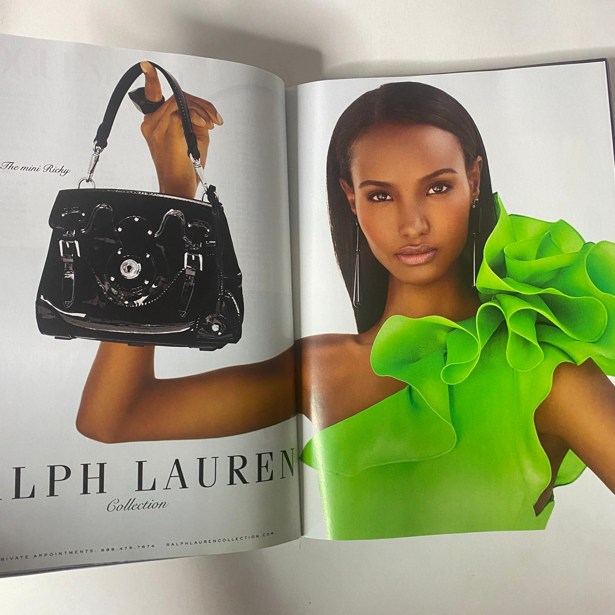 Vogue Magazine March 2014 Rihanna Cover No Label VG with a vibrant image of a model showcasing Ralph Lauren's collection, exemplifying chic fashion design.