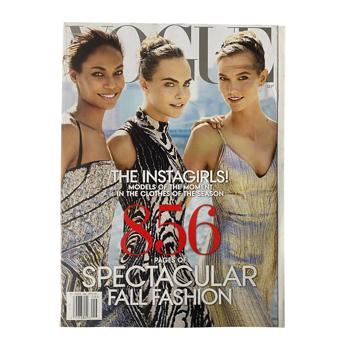 Vogue Magazine September 2014 featuring Cara Delevingne and Karlie Kloss on the cover, highlighting 856 pages of spectacular fall fashion.