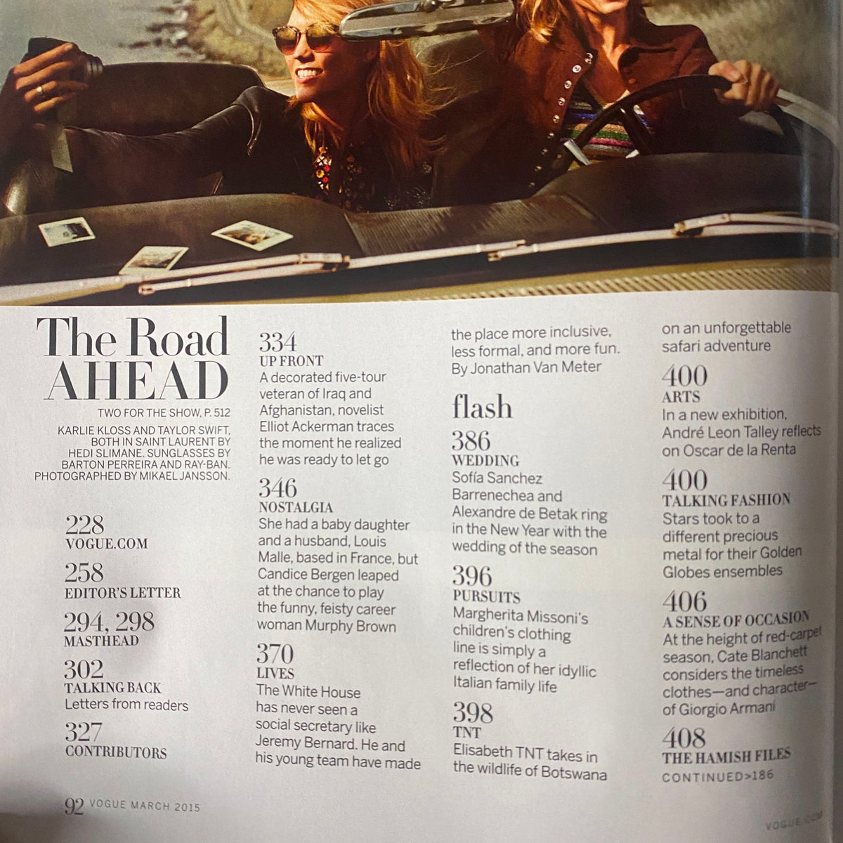 Vogue Magazine March 2015 Taylor Swift and Karlie Kloss Cover, featuring a vintage car backdrop showcasing the iconic duo celebrating friendship and fame.