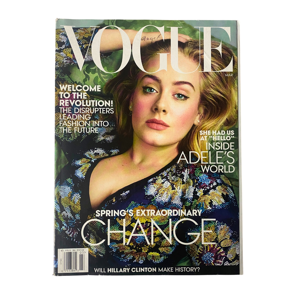 Vogue Magazine March 2016 Adele Cover, featuring a striking image of Adele with an elegant hairstyle and stunning fashion, highlighting her influence in the music industry.