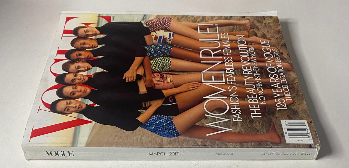 Back cover of Vogue Magazine March 2017 showing the same multi-model shoot with the phrase 'Women Rule! Fashion's Fearless Females'. This cover is part of a celebration of 125 years of Vogue.