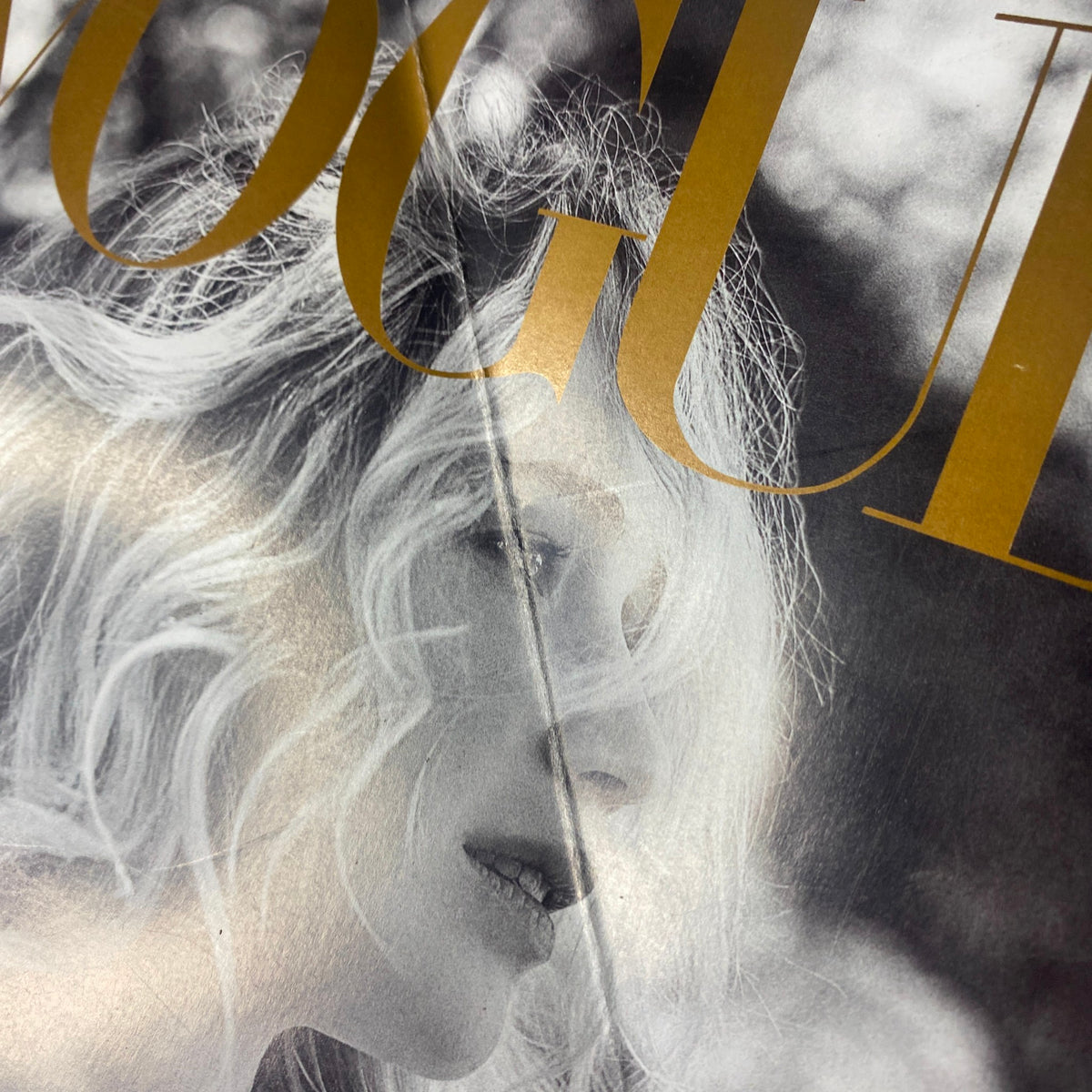 Close-up of the Vogue Magazine September 2017 cover, showcasing Jennifer Lawrence's profile in black-and-white with flowing hair, emphasizing her sophisticated look for the 125th Anniversary Collector's Edition.