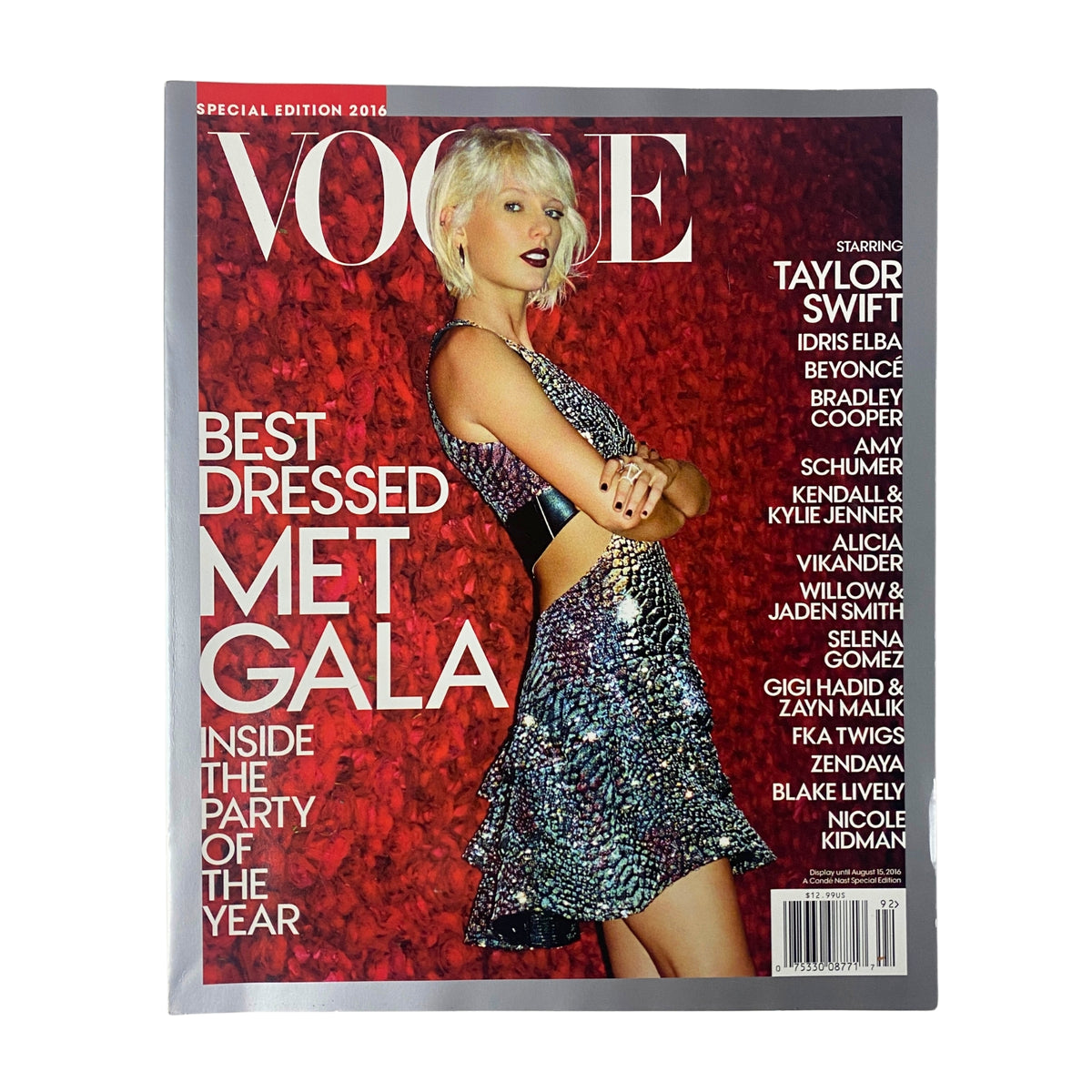 Vogue Magazine 2016 Taylor Swift Cover for Met Gala featuring Taylor Swift in sparkling attire, labeled 'Best Dressed Met Gala'. This special edition highlights celebrity fashion and the 2016 Met Gala event.