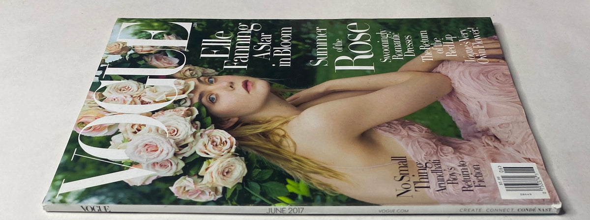 Side view of Vogue Magazine June 2017 with Elle Fanning on the cover, showcasing her elegance and the romantic summer theme, 'Summer of the Rose'.