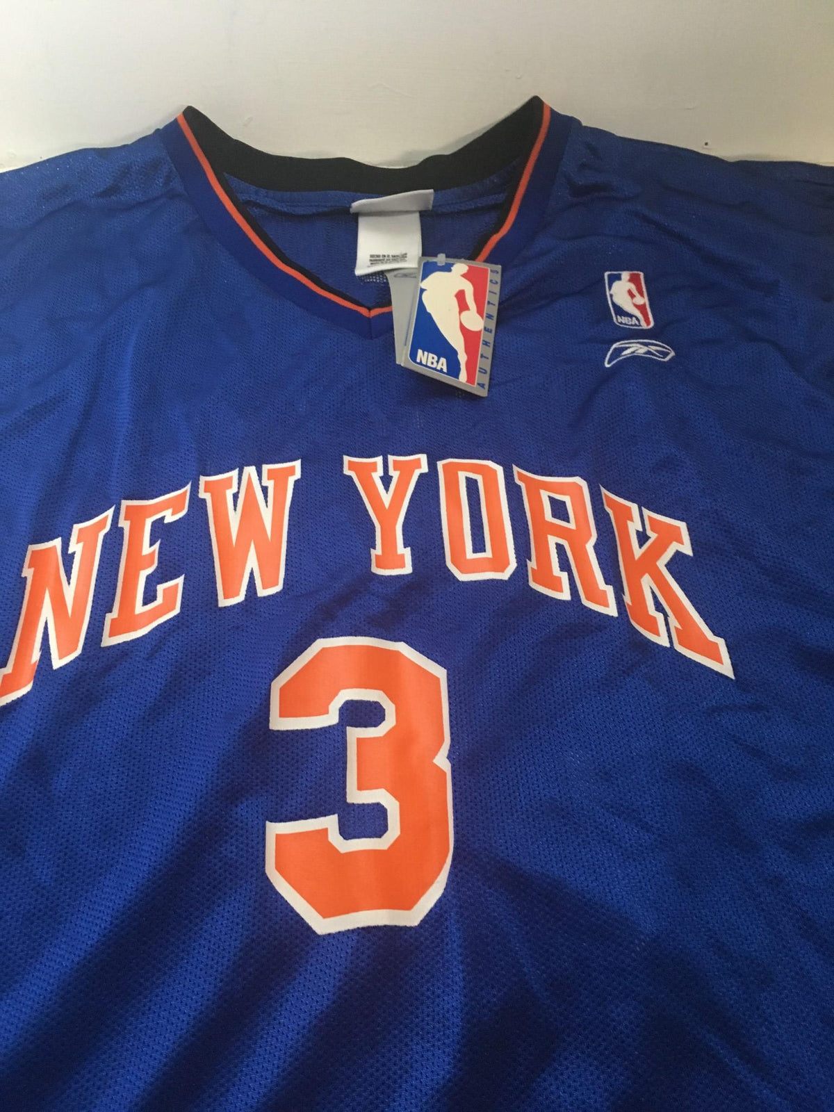 Close-up of the NBA New York Knicks Stephon Marbury #3 jersey size 2XL, highlighting the mesh texture and vibrant team colors.