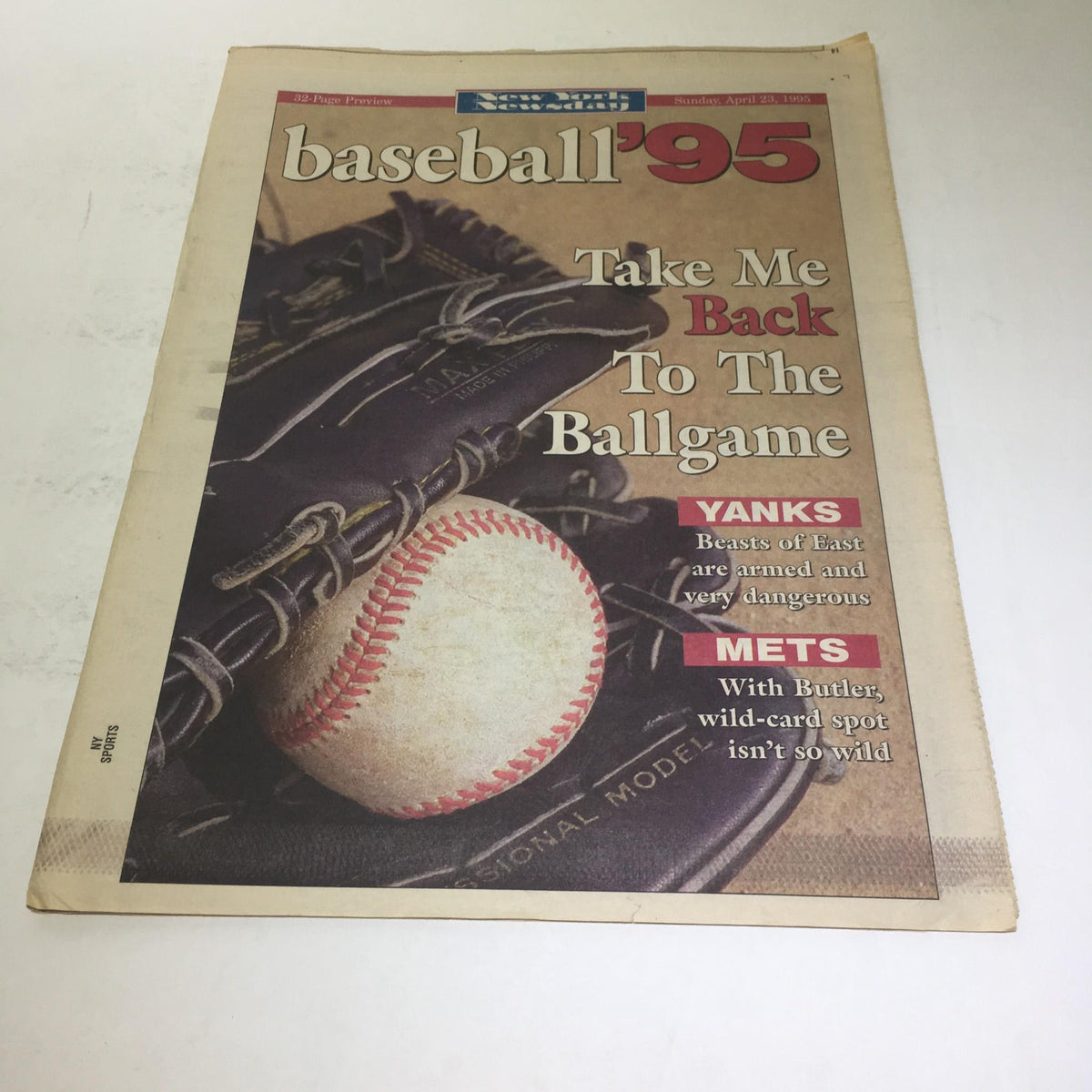 Cover of New York Newsday: April 23 1995 Baseball '95 featuring a baseball and a glove with the headline 'Take Me Back To The Ballgame'.