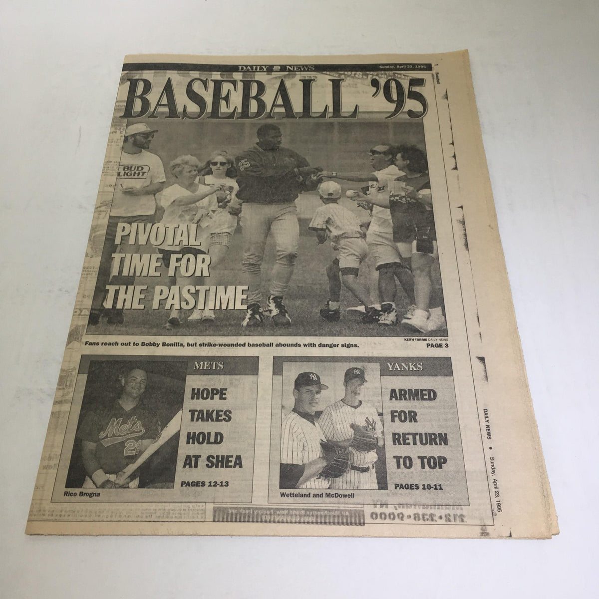 NY Daily News cover from April 23, 1995 featuring the title 'Baseball '95' showcasing pivotal moments in baseball featuring players and fans.