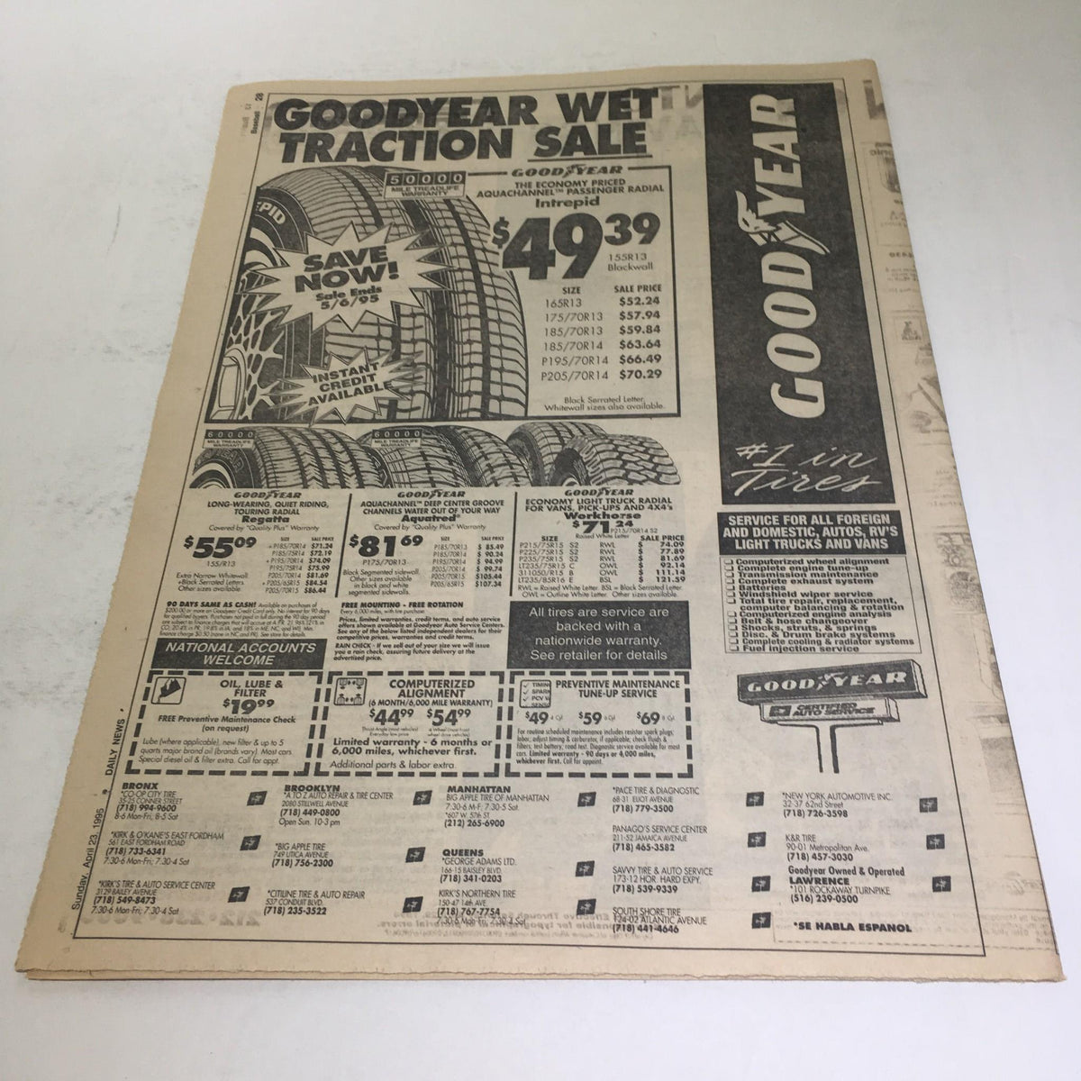 The NY Daily News advertisement for Goodyear Wet Traction Sale from April 23, 1995, showcasing tire prices and offers.