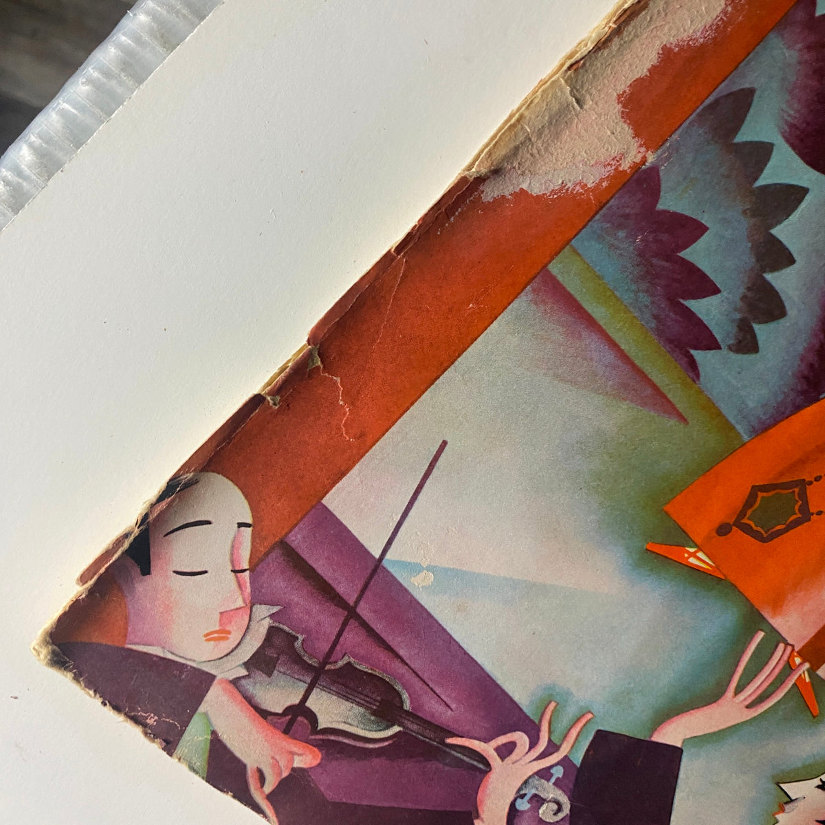 Cover detail from The New Yorker Complete Magazine January 7, 1928 featuring artwork by Constantin Alajalov, showcasing vibrant colors and stylized figures.
