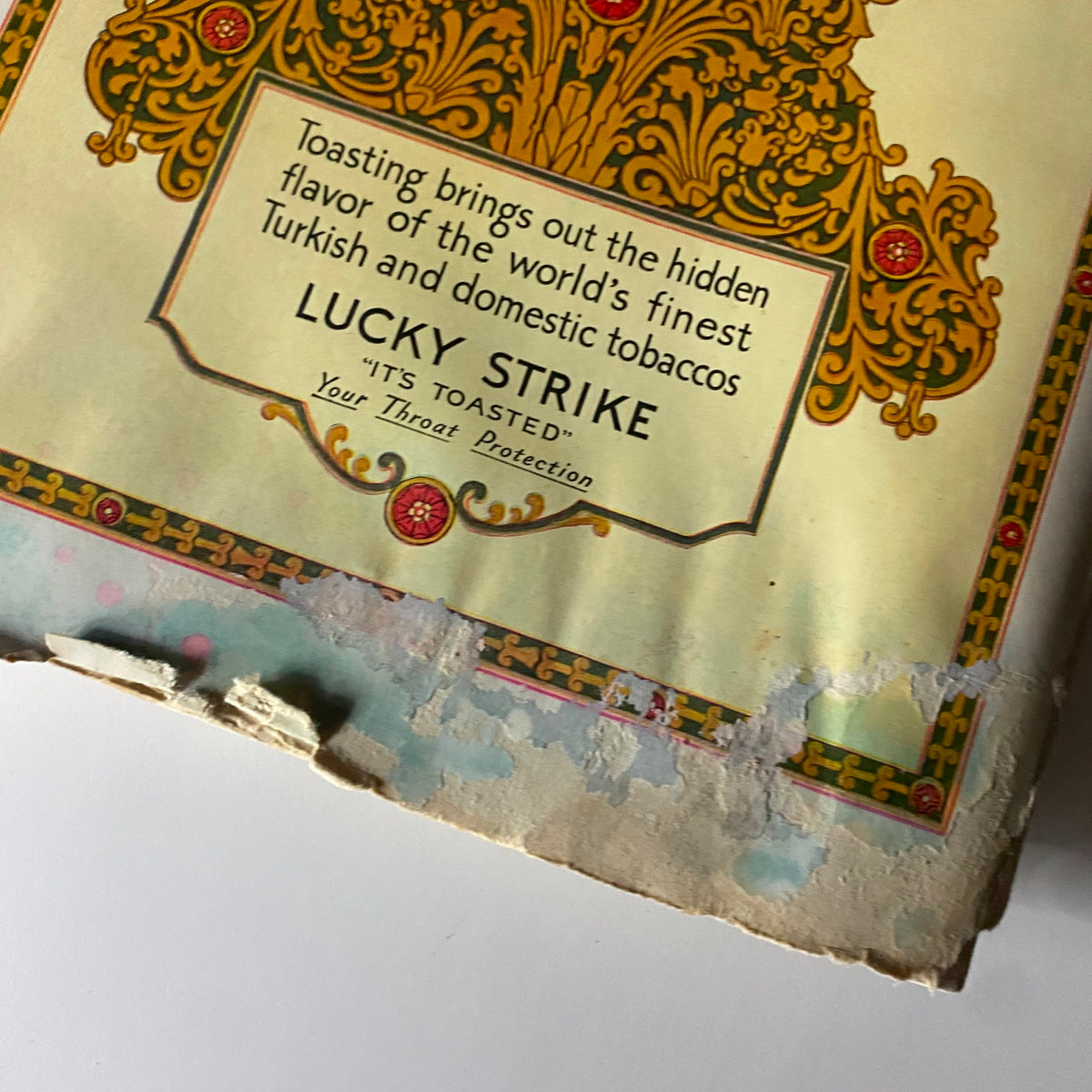 Close-up of a Lucky Strike cigarette advertisement, showcasing its design and tagline, from The New Yorker Complete Magazine – April 9, 1927. The ad promotes the toasted品質.