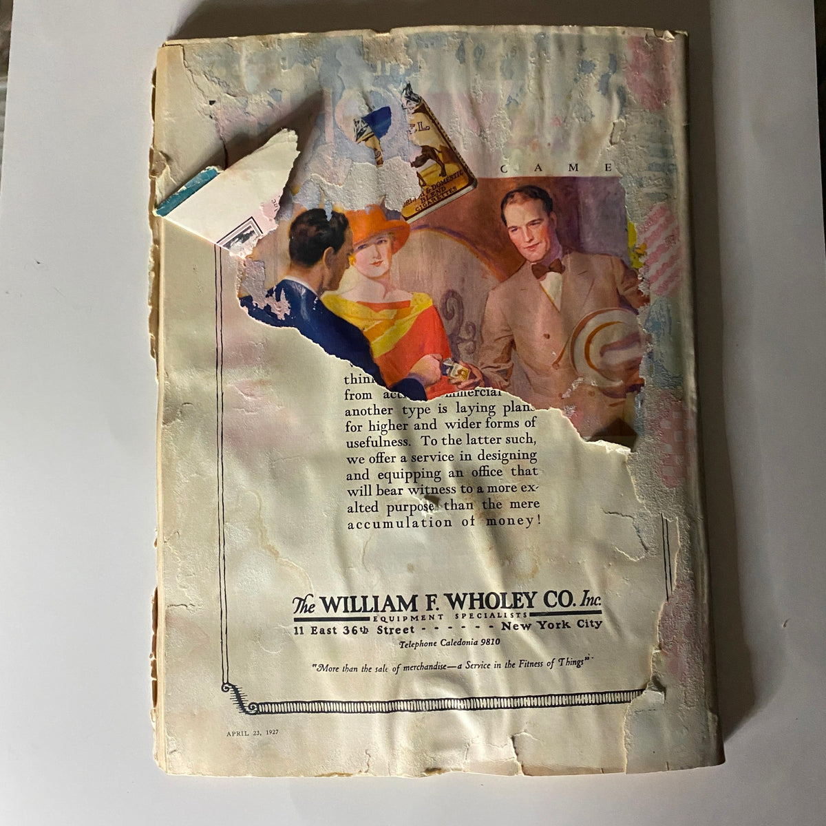 Back cover of The New Yorker Complete Magazine April 23, 1927 showing a damaged yet colorful advertisement from The William F. Wholey Co., Inc.