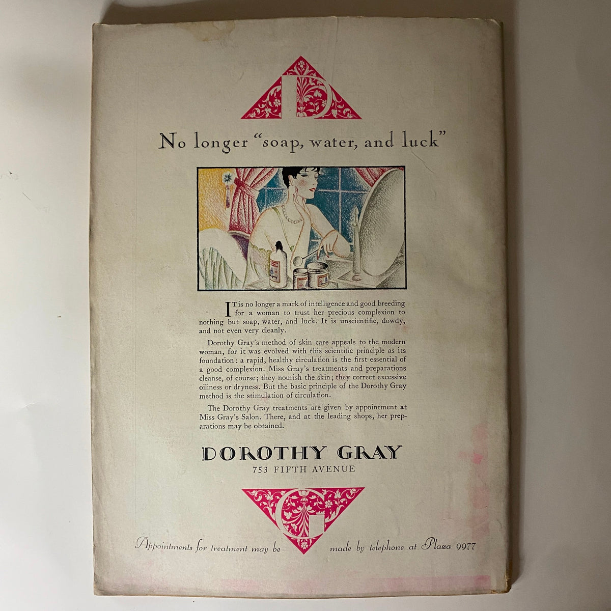 Advertisement from The New Yorker Complete Magazine – October 29, 1927 featuring a woman at a vanity and promoting Dorothy Gray cosmetics, exemplifying early 20th-century design.