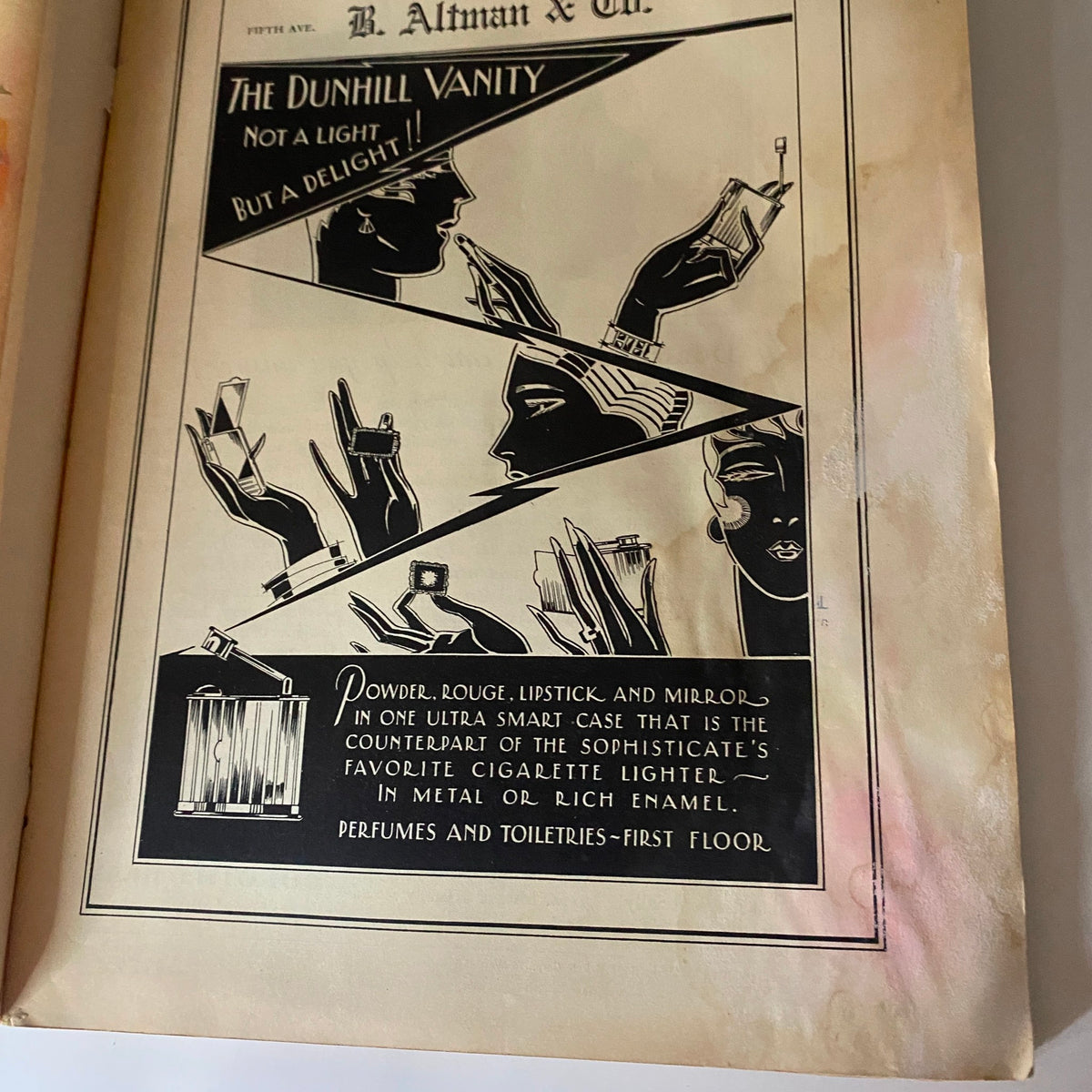 Interior page of The New Yorker Complete Magazine October 8, 1927 featuring an advertisement for Dunhill Vanity, showcasing elegant makeup items and a cigarette lighter.
