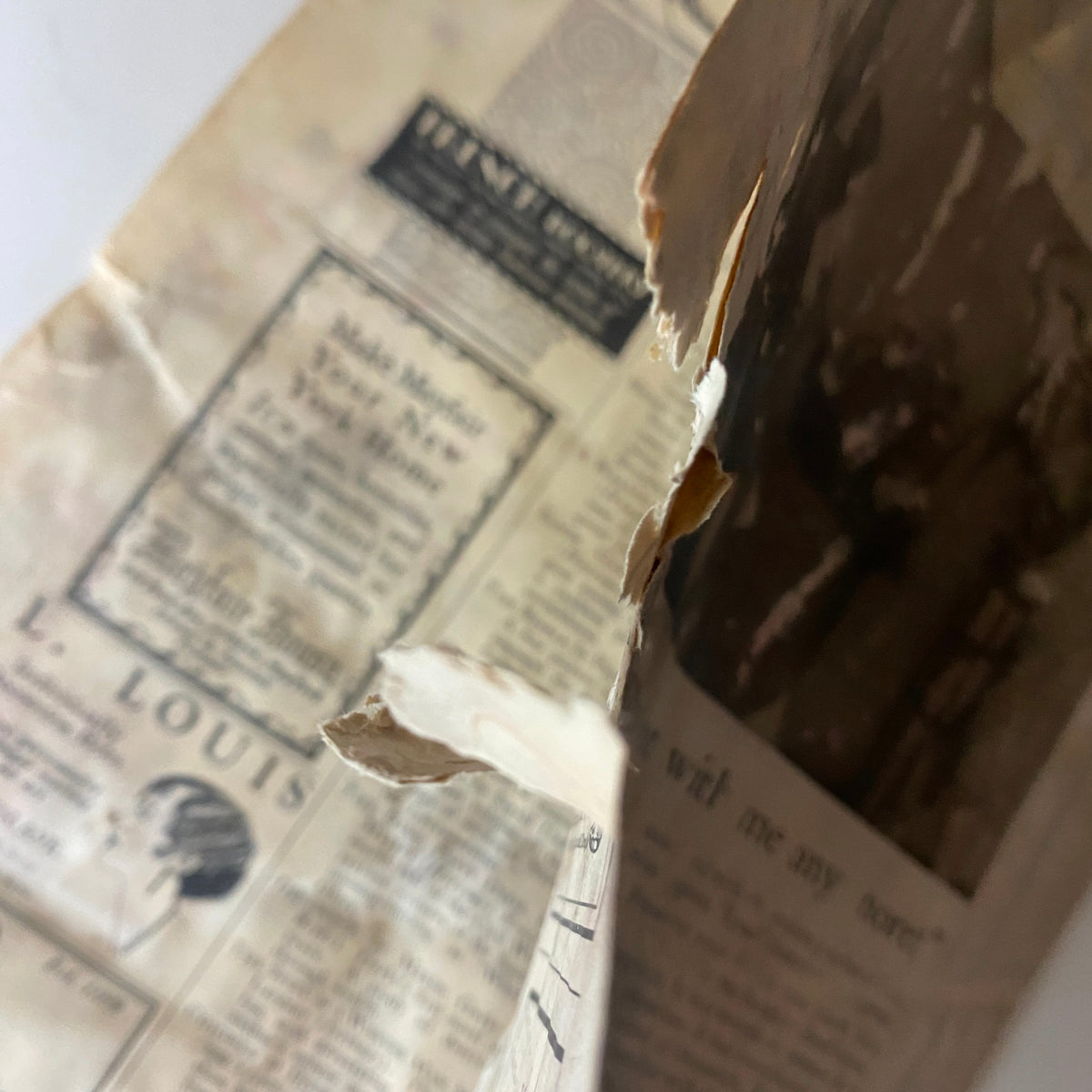 Detailed view of The New Yorker Complete Magazine – April 16, 1927 Ilonka Karasz Cover, showcasing aged pages with visible wear and tear.