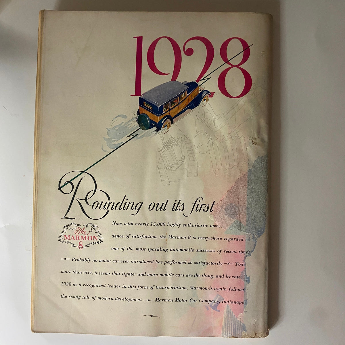 Back cover of The New Yorker Complete Magazine December 10, 1927 highlighting an advertisement for the Marmon automobile with a vintage car illustration.
