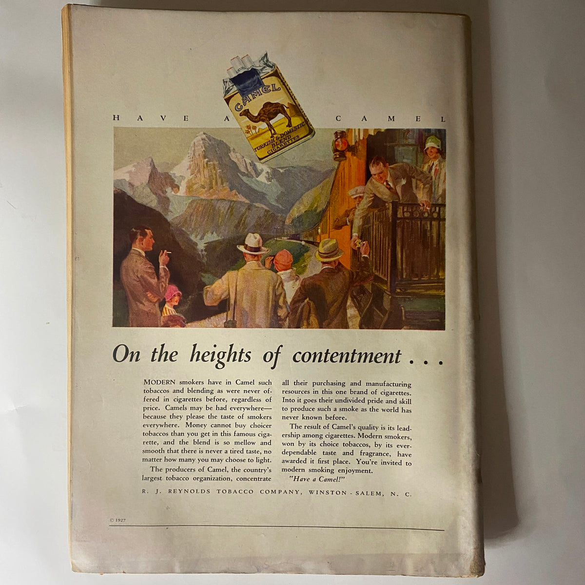 Back cover of The New Yorker September 10, 1927, featuring an illustration by the Reynolds Tobacco Company with a scenic mountain view and a message about enjoyment.