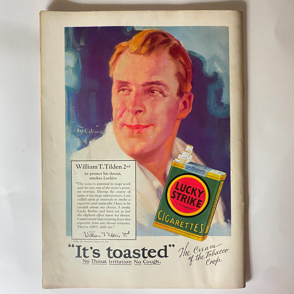 Vintage advertisement featuring William T. Tilden 2nd promoting Lucky Strike cigarettes in The New Yorker magazine dated July 21, 1928. The image showcases colorful artwork and highlights the slogan 'It's toasted - No Throat Irritation No Cough'.