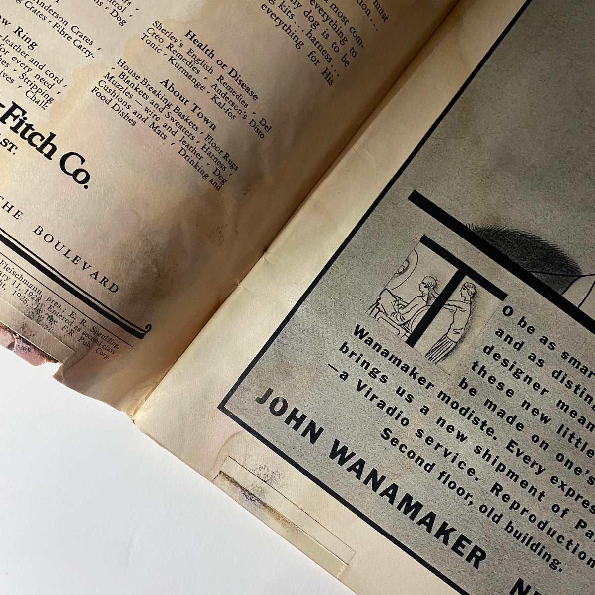 Interior page of The New Yorker Complete Magazine February 11, 1928 featuring advertisements, including a vintage ad for John Wanamaker.